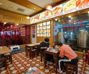 epa10354531 People dine in a restaurant in Beijing, China, 08 December 2022. Despite daily cases increasing, Chinese officials announced an easing of the COVID-19 restriction measures on 07 December 2022, lockdown measures now only targets buildings, units or floors rather than whole residential compounds or cities, while Beijing restaurants restored dine-in services. People now need COVID-19 negative results taken within 48 hours to dine in.  EPA/WU HAO
