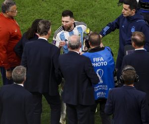 epa10358388 Lionel Messi of Argentina speaks to Netherlands head coach Louis Van Gaal and assistant coach Edgar Davids at the end of their FIFA World Cup 2022 quarter final match between the Netherlands and Argentina, at Lusail Stadium, Lusail, Qatar, 09 December 2022.  EPA/JOSE SENA GOULAO