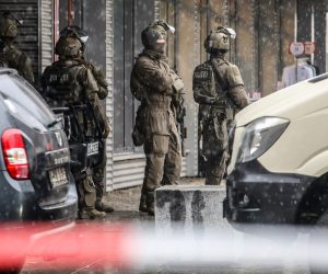 epa10358772 Members of a special police task force unit secure the area near a shopping center in Dresden, Germany, 10 December 2022. Police announced on its social media that a hostage situation in the eastern German city of Dresden was over and that two people were released 'unharmed', after evacuating a shopping mall and its surroundings in the city center.  EPA/MATTHIAS SCHUMANN