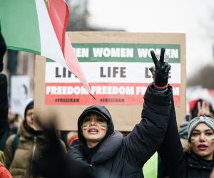 epa10359136 People take part in a rally in Berlin, Germany, 10 December 2022. The women and girls rights non-profit-organization Terre des Femmes and other groups called for a rally in solidarity with protesters in Iran, on the occasion of the international Human Rights Day. Further rallies were expected to take place in Hamburg, Cologne, Frankfurt, Stuttgart und Munich.  EPA/CLEMENS BILAN