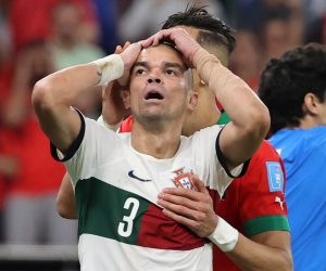 epa10359612 Jawad El Yamiq (C) of Morocco and Pepe (L) of Portugal react during the FIFA World Cup 2022 quarter final soccer match between Morocco and Portugal at Al Thumama Stadium in Doha, Qatar, 10 December 2022.  EPA/Ali Haider