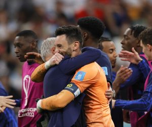 epa10360347 France's head coach Didier Deschamps (C-L) and goalkeeper Hugo Lloris (C) celebrate after winning the FIFA World Cup 2022 quarter final soccer match between England and France at Al Bayt Stadium in Al Khor, Qatar, 10 December 2022.  EPA/Ronald Wittek