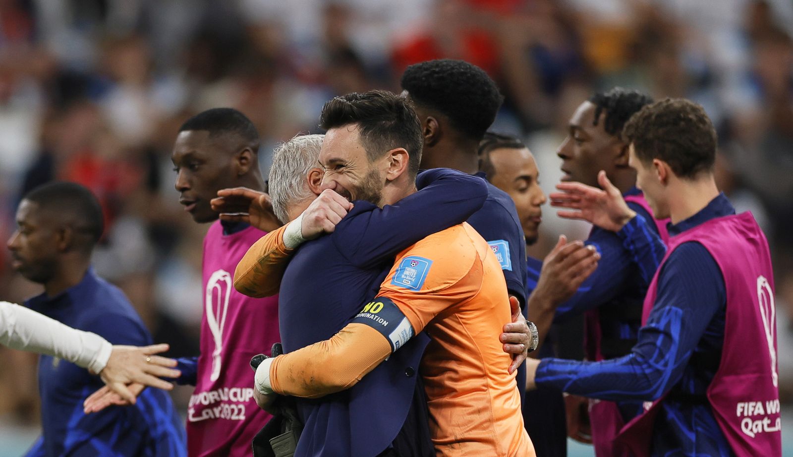 epa10360347 France's head coach Didier Deschamps (C-L) and goalkeeper Hugo Lloris (C) celebrate after winning the FIFA World Cup 2022 quarter final soccer match between England and France at Al Bayt Stadium in Al Khor, Qatar, 10 December 2022.  EPA/Ronald Wittek