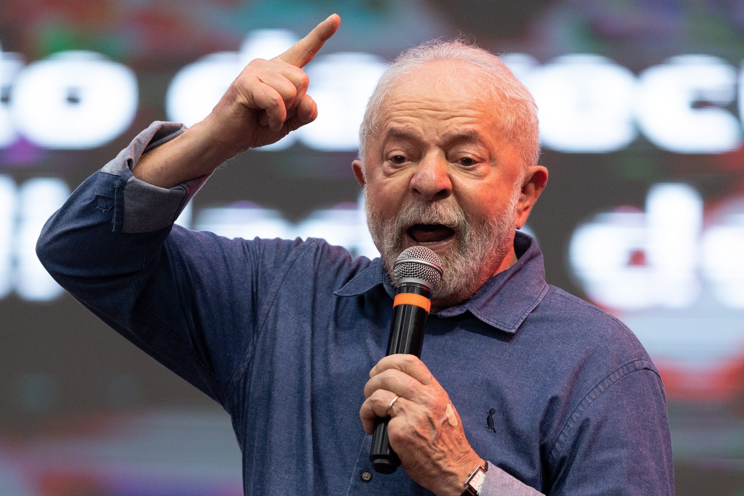 epa10367608 The President-elect of Brazil, Luiz Inacio Lula da Silva, delivers a speech during the celebration of Christmas for Waste Pickers and the Street Population, in Sao Paulo, Brazil, 15 December 2022. Lula ratified on 15 December the marked social accent that his government will have and assured in front of hundreds of garbage collectors that the poor 'will recover the right to have rights.'  EPA/Isaac Fontana