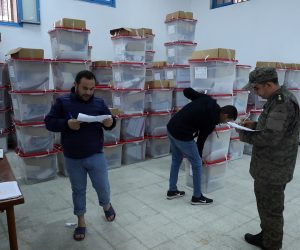 epa10368525 A worker of Tunisia's Independent High Authority for Elections (ISIE) checks ballot boxes a day ahead of the legislative elections in Tunis, Tunisia, 16 December 2022. Tunisia will hold a legislative elections on 17 December in order to elect the 217 members of the Assembly of the Representatives of the People of Tunisia. A second round takes place in February or March 2023 in the constituencies on the ballot.  EPA/MOHAMED MESSARA