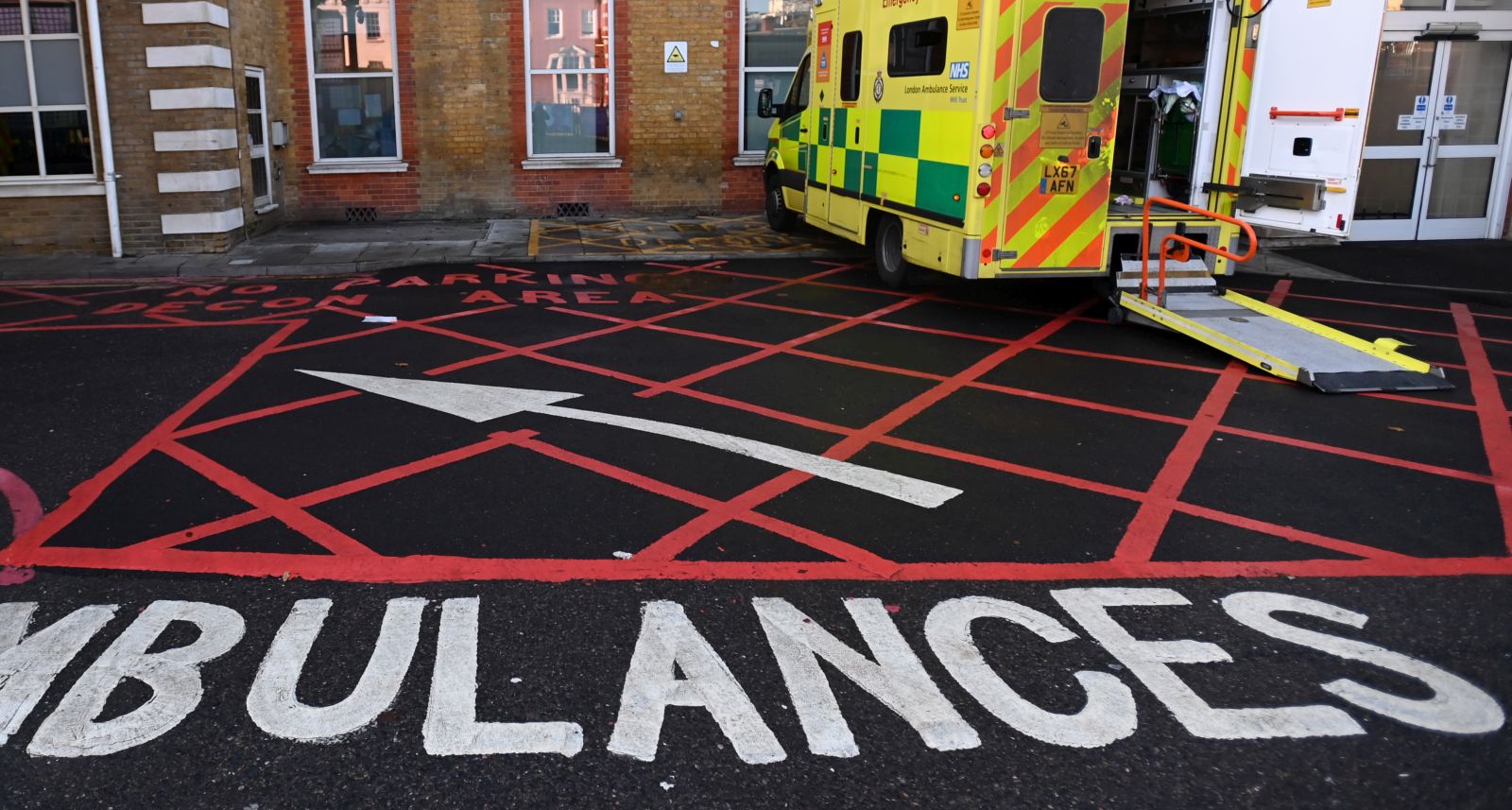 epa10374767 An NHS ambulance outside a hospital in London, Britain, 20 December 2022. More than 10,000 NHS ambulance staff from nine NHS hospital trusts in Britain and Wales will walk out on 21 December in a dispute over pay. The paramedics strike follows a second day of nurses strikes.  EPA/ANDY RAIN