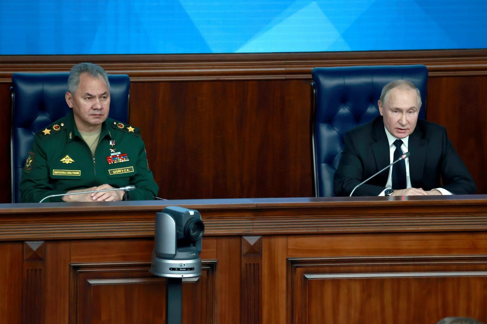 epa10375650 Russian President Vladimir Putin (R) and Defence Minister Sergei Shoigu attend an expanded meeting of the Russian Defence Ministry Board at the National Defence Control Centre in Moscow, Russia, 21 December 2022. Sergei Shoigu announced plans to put into service next year 22 launchers with intercontinental ballistic missiles Yars, Avangard and Sarmat, three Tu-160M strategic bombers, five submarines and 12 ships. Russian President Vladimir Putin supported the proposals made by the country's Defense Minister Sergei Shoigu on reforming the armed forces and instructed to report on the results of their discussion at the board of the department.  EPA/SERGEY FADEICHEV/KREMLIN / POOL MANDATORY CREDIT