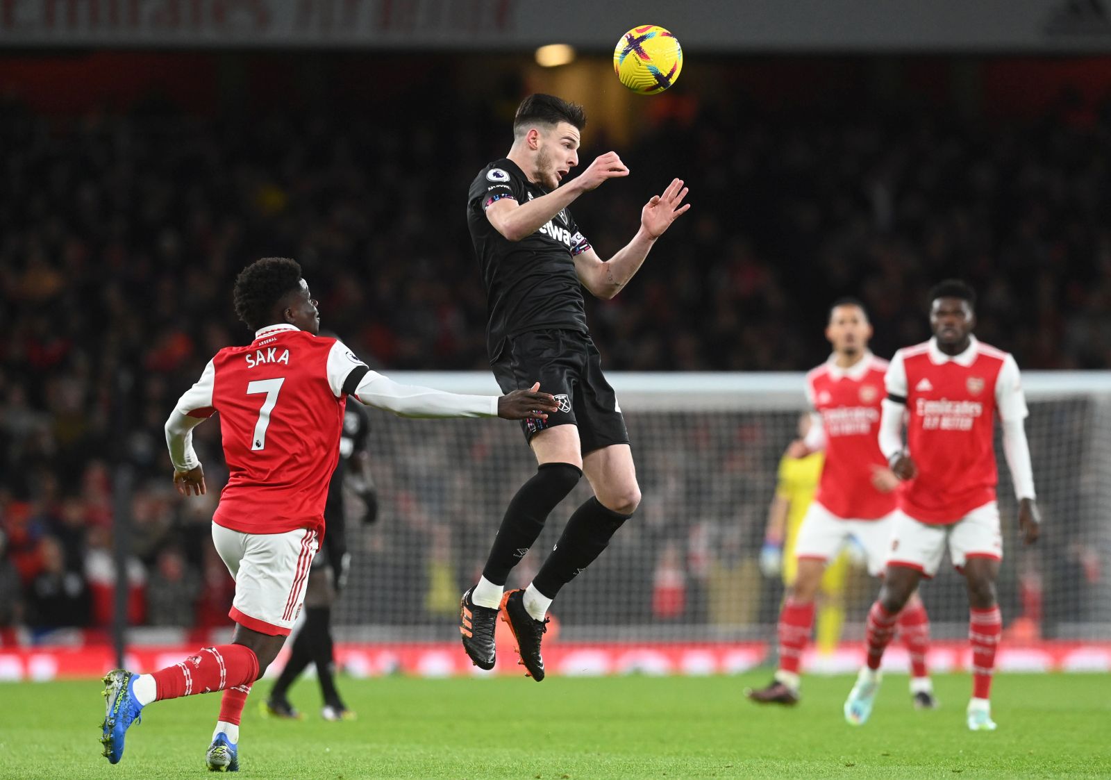 epa10378809 West Ham's Declan Rice () in action during the English Premier League moccer match between Arsenal Football Club and West Ham United in London, Britain, 26 December 2022.  EPA/Neil Hall EDITORIAL USE ONLY. No use with unauthorized audio, video, data, fixture lists, club/league logos or 'live' services. Online in-match use limited to 120 images, no video emulation. No use in betting, games or single club/league/player publications