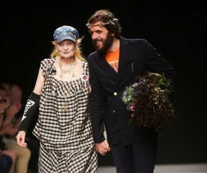 epa10381971 (FILE) - British fashion designer Vivienne Westwood (L) and husband Andreas Kronthaler (R) acknowledge the audience after the presentation of her  Spring/Summer 2013 Men's collection during the Milan Fashion Week, in Milan, Italy, 24 June 2012 (reissued 29 December 2022). Vivenne Westwood died on 29 December 2022 at the age of 81, according to a statement posted on her social media accounts.  EPA/MATTEO BAZZI *** Local Caption *** 50402100