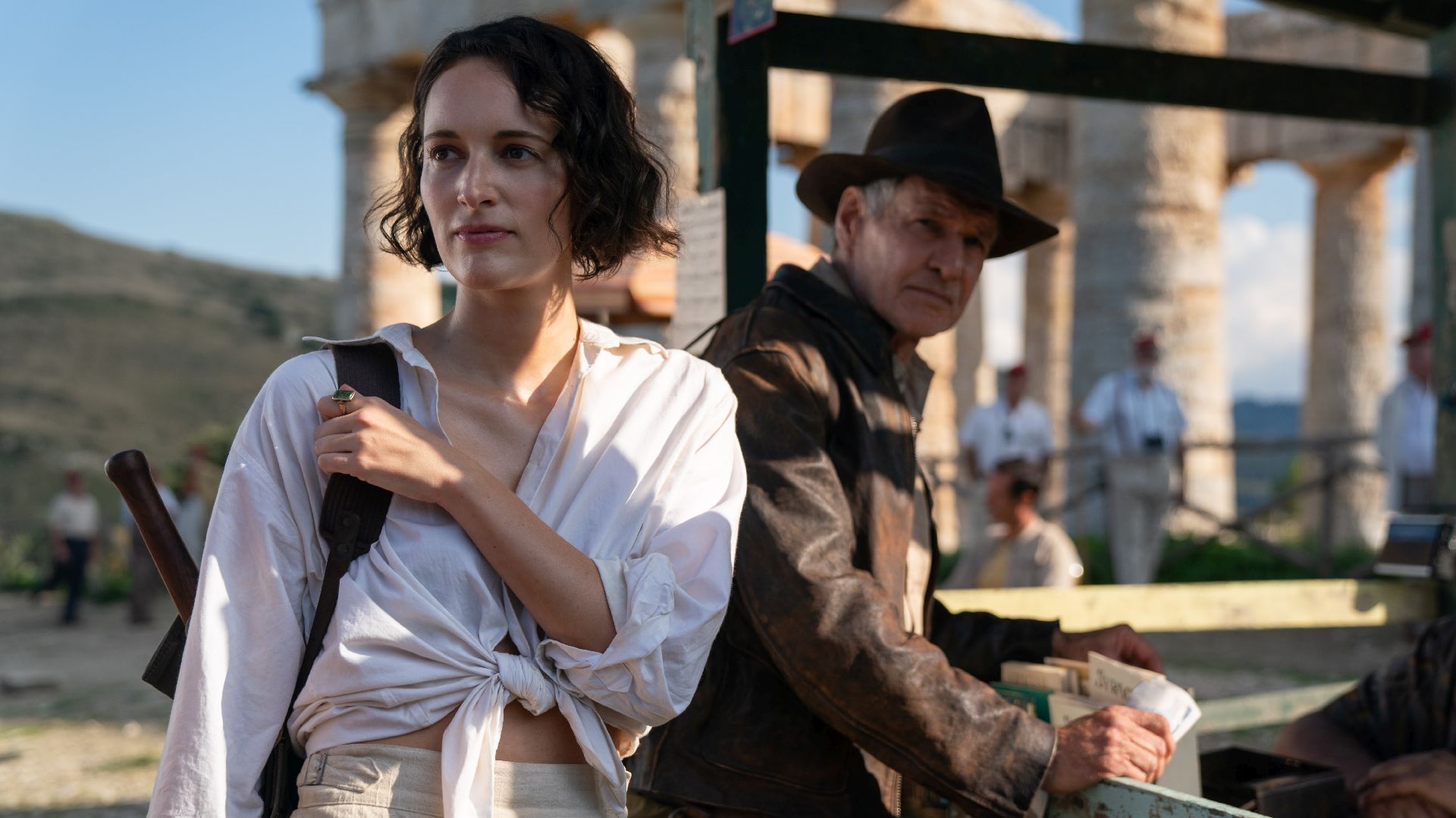 (L-R): Helena (Phoebe Waller-Bridge) and Indiana Jones (Harrison Ford) in Lucasfilm's Indiana Jones and the Dial of Destiny. ©2022 Lucasfilm Ltd. & TM. All Rights Reserved.