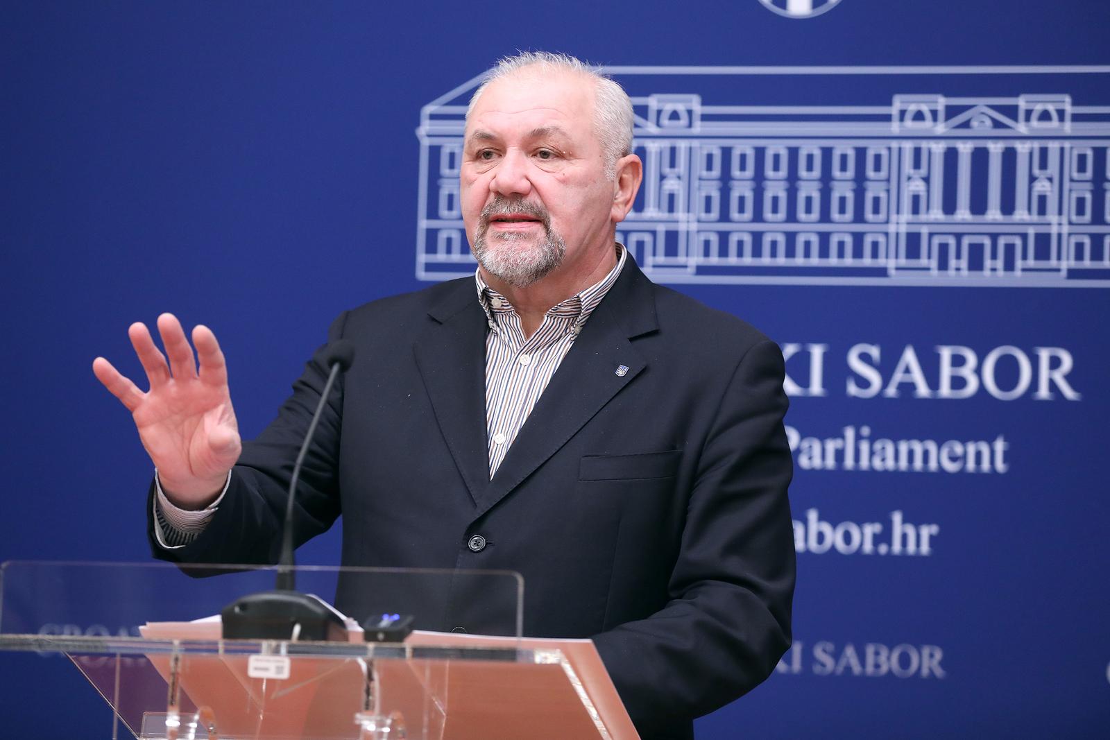 15.12.2022., Zagreb - Na konferenciji za medije odrzanoj u Saboru o temi „Prijedlog zakona o izmjeni Zakona o dobrovoljnom zdravstvenom osiguranju" govorio je zastupnik Silvano Hrelja. Photo: Patrik Macek/PIXSELL