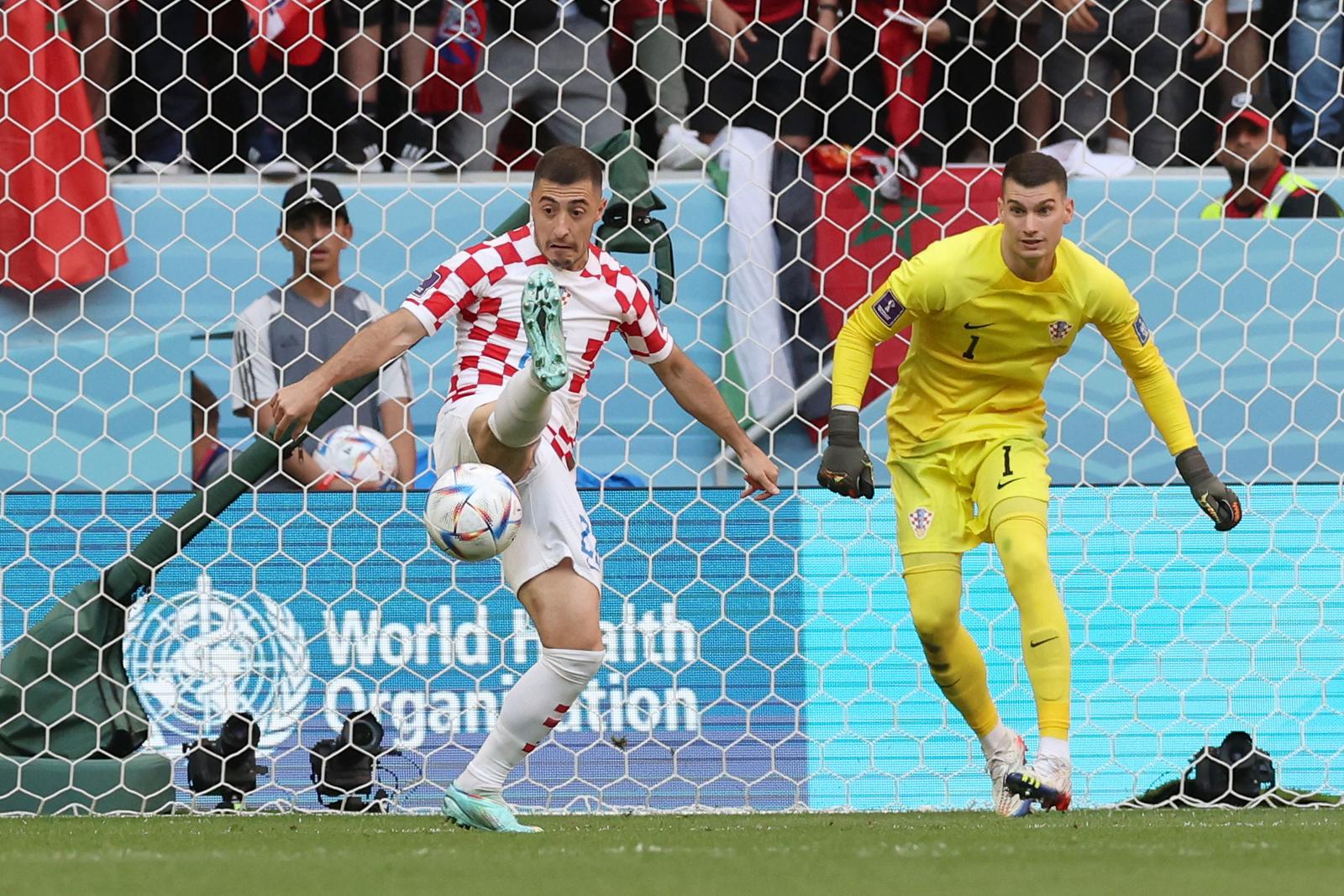 23.11.2022., stadion Al Bayt, Al Khor, Katar - FIFA Svjetsko prvenstvo, skupina F, 1. kolo, Maroko - Hrvatska. Josip Juranovic, Dominik Livakovic Photo: Goran Stanzl/PIXSELL