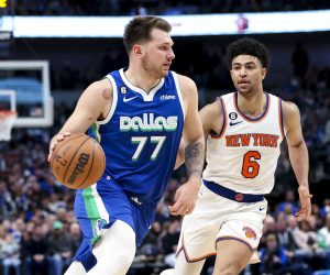Dec 27, 2022; Dallas, Texas, USA;  Dallas Mavericks guard Luka Doncic (77) drives to the basket past New York Knicks guard Quentin Grimes (6) during the second half at American Airlines Center. Mandatory Credit: Kevin Jairaj-USA TODAY Sports Photo: Kevin Jairaj/REUTERS