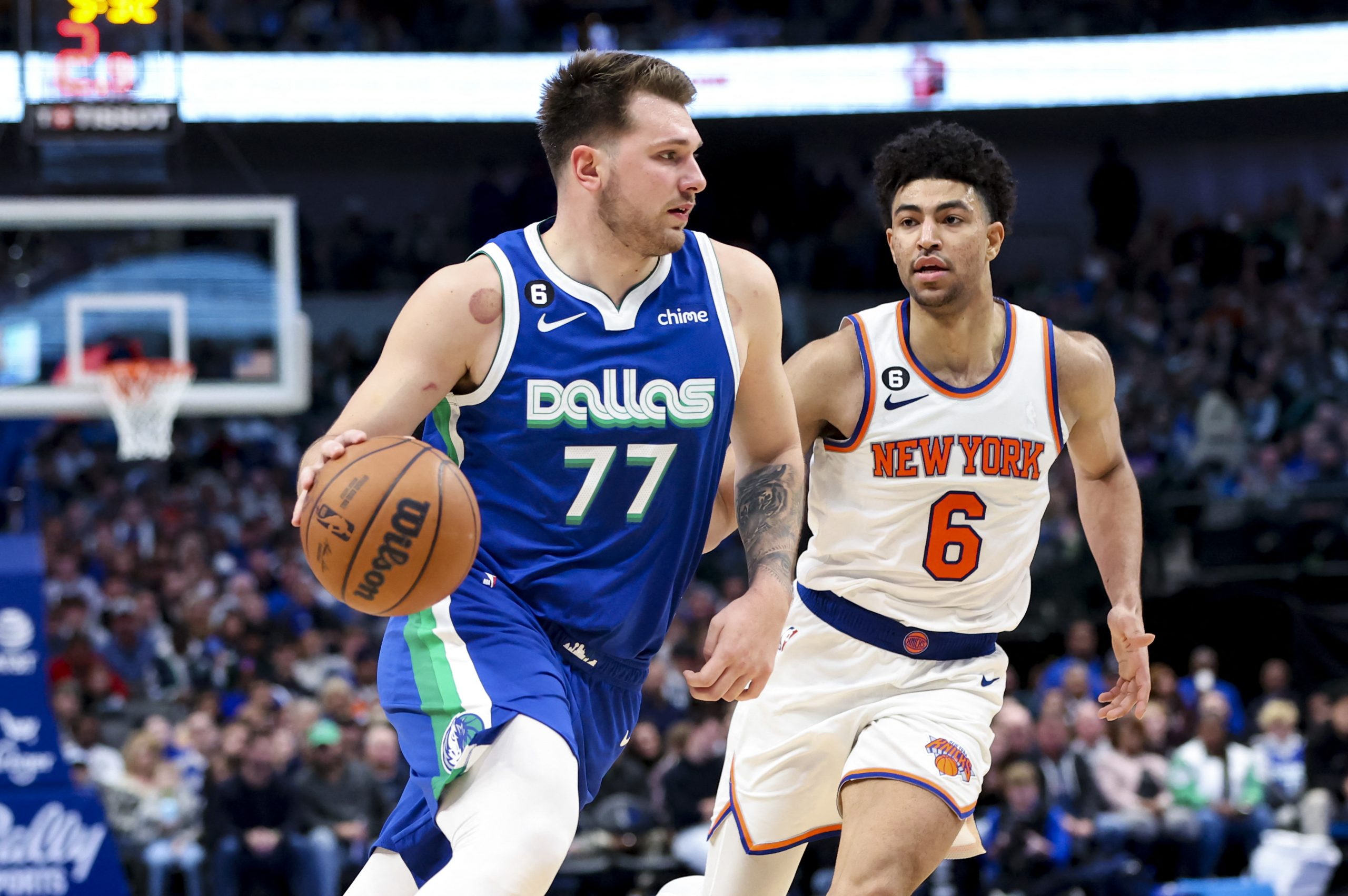 Dec 27, 2022; Dallas, Texas, USA;  Dallas Mavericks guard Luka Doncic (77) drives to the basket past New York Knicks guard Quentin Grimes (6) during the second half at American Airlines Center. Mandatory Credit: Kevin Jairaj-USA TODAY Sports Photo: Kevin Jairaj/REUTERS