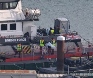 epa10365329 People prepare to disembark a Border Force vessel in Dover Harbour, Dover, Britain, 14 December 2022. A search and rescue operation was launched in the English Channel after an incident involving a small boat was reported. The British Government have reported that three people have died and 43 have been rescued.  EPA/STUART BROCK