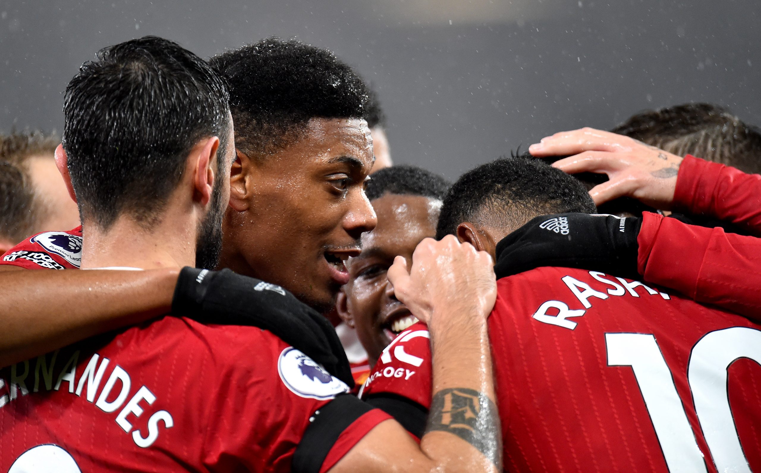epa10379471 Anthony Martial (C) of Manchester United celebrates with teammates after scoring the 2-0 during the English Premier League soccer match between Manchester United and Nottingham Forest in Manchester, Britain, 27 December 2022.  EPA/Peter Powell EDITORIAL USE ONLY. No use with unauthorized audio, video, data, fixture lists, club/league logos or 'live' services. Online in-match use limited to 120 images, no video emulation. No use in betting, games or single club/league/player publications