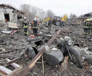 epa10381414 Ukrainian rescue workers at the scene of a destroyed residential building following a Russian missile strike in the outskirts of Kyiv, Ukraine, 29 December 2022. Russian missiles targeted major cities across Ukraine early 29 December, the head of the Kyiv City Military Administration, Serhiy Popko wrote on telegram that 16 missiles targeting the Ukrainian capital Kyiv have been destroyed, and that at least three people were injured. The city Mayor, Vitali Klitschko said that 40 percent of the capital's consumers were without electricity after the attacks.  EPA/SERGEY DOLZHENKO