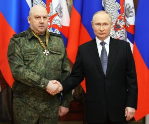 epa10384013 Russian President Vladimir Putin (R) shakes hands with commander of Russia's military operation in Ukraine General Sergei Surovikin, awarded with order of Saint George of the Third Class, during his visit to the Southern Military District, as Russia's so-called "special military operation" continues, at an undisclosed location in Rostov region, Russia, 31 December 2022.  EPA/MIKHAEL KLIMENTYEV/SPUTNIK/KREMLIN POOL / POOL MANDATORY CREDIT