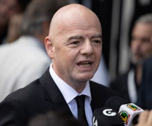 epa10386385 FIFA President Gianni Infantino attends the wake for Edson Arantes do Nascimento 'Pele', at the Vila Belmiro stadium in the city of Santos, Brazil, 02 January 2023. Several Brazilian soccer fans spent the night lining up to attend Pele's wake who died on 29 December 2022 at the age of 82.  EPA/Isaac Fontana
