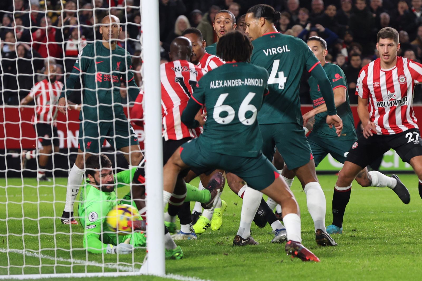 epa10386622 Players react as a ball deflected off Ibrahima Konate of Liverpool (unseen) on its way to enter the net to become the 1-0 goal during the English Premier League soccer match between Brentford FC and Liverpool FC in Brentford, Britain, 02 January 2023.  EPA/Kieran Galvin EDITORIAL USE ONLY. No use with unauthorized audio, video, data, fixture lists, club/league logos or 'live' services. Online in-match use limited to 120 images, no video emulation. No use in betting, games or single club/league/player publications