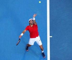 epa10388334 Borna Coric of Croatia in action against Stefanos Tsitsipas of Greece during the 2023 United Cup City Final tennis tournament match between Greece and Croatia at RAC Arena in Perth, Australia, 04 January 2023.  EPA/RICHARD WAINWRIGHT EDITORIAL USE ONLY AUSTRALIA AND NEW ZEALAND OUT