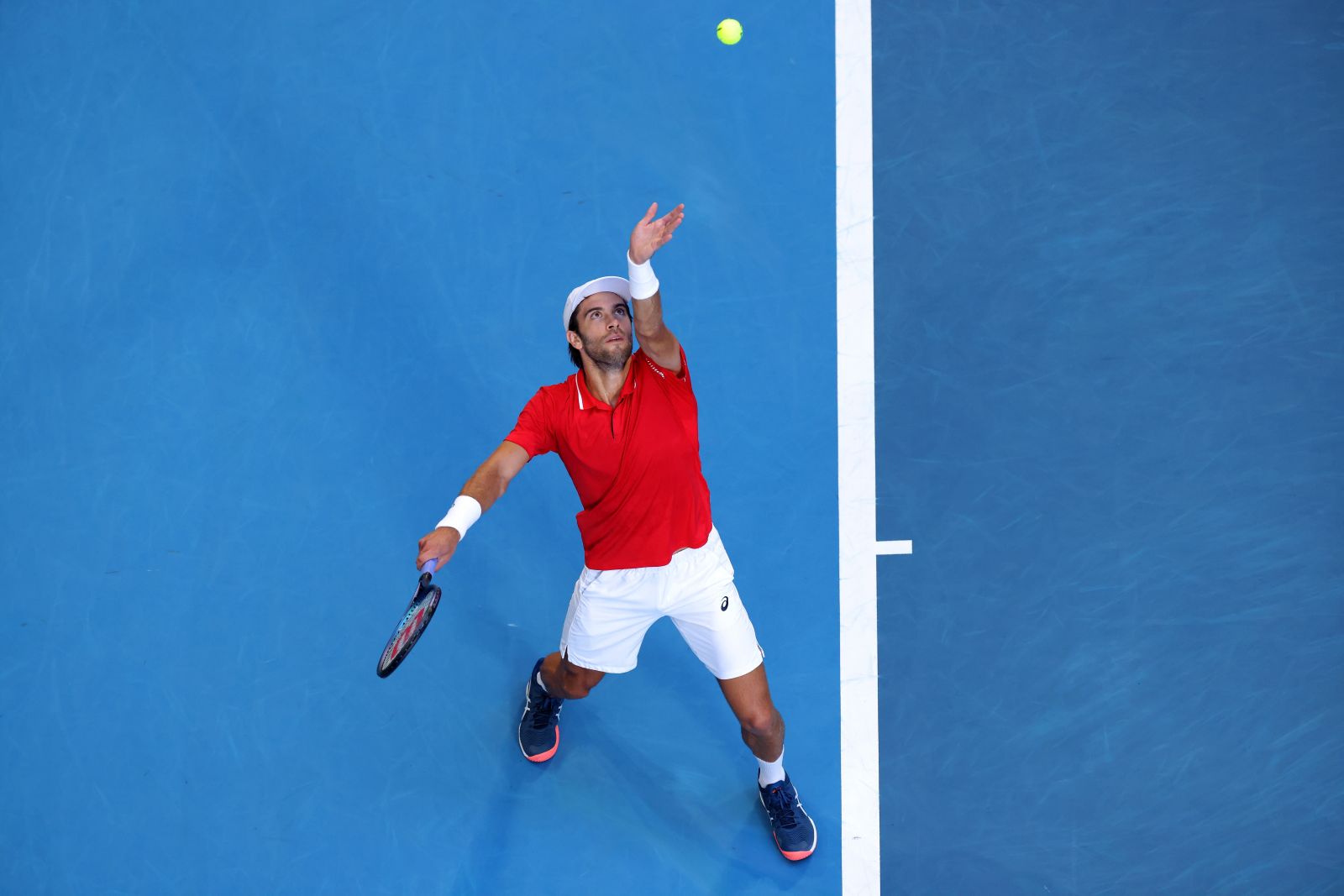 epa10388334 Borna Coric of Croatia in action against Stefanos Tsitsipas of Greece during the 2023 United Cup City Final tennis tournament match between Greece and Croatia at RAC Arena in Perth, Australia, 04 January 2023.  EPA/RICHARD WAINWRIGHT EDITORIAL USE ONLY AUSTRALIA AND NEW ZEALAND OUT