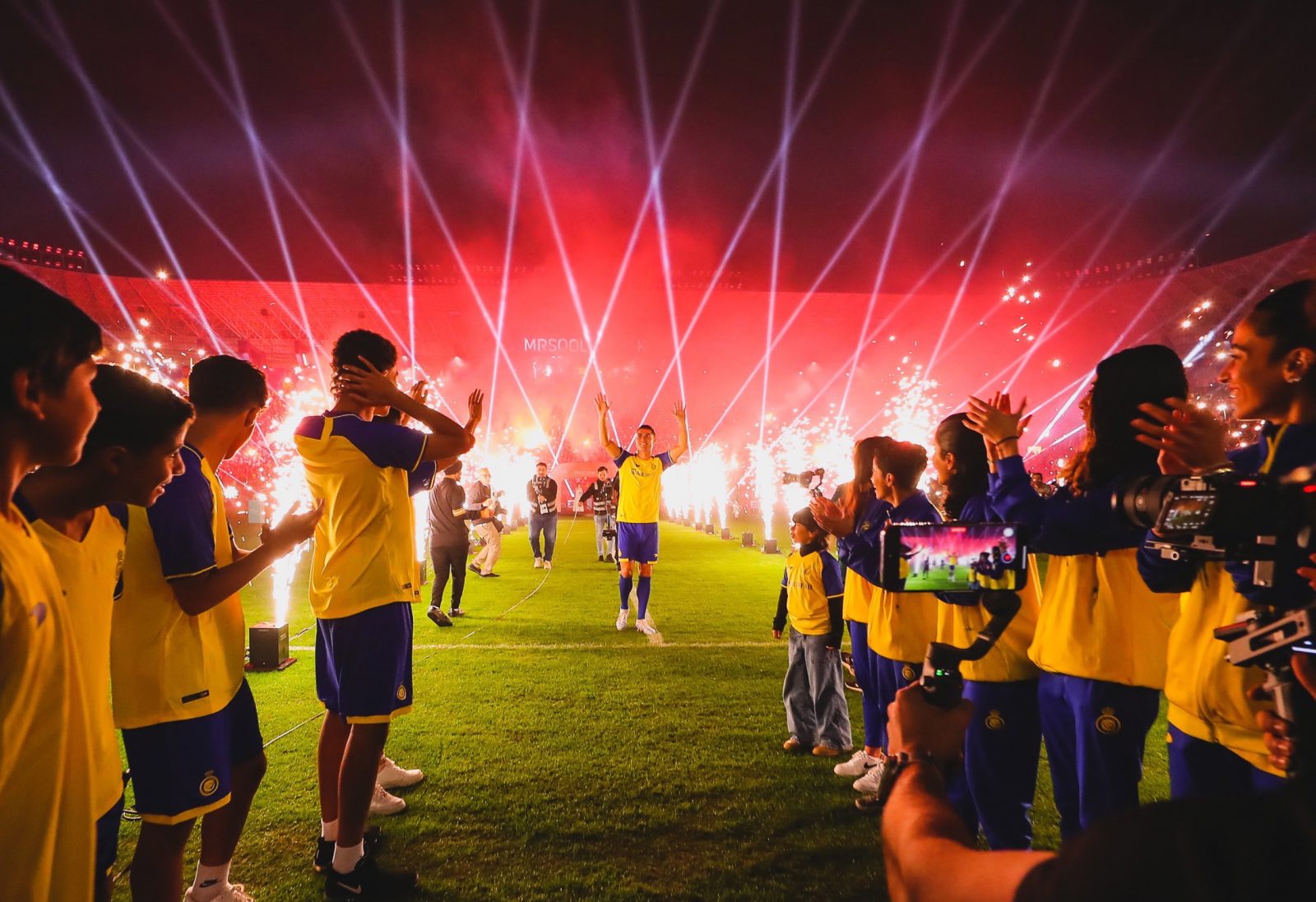 epa10388740 A handout photo made available by the Saudi Al-Nassr Club on 04 January 2023 shows Al-Nassr's new Portuguese forward Cristiano Ronaldo attending a presenting ceremony at Mrsool Park Stadium, in Riyadh, Saudi Arabia, 03 January 2023. Cristiano Ronaldo is presented at Mrsool Park stadium on 03 January after he signed a contract for Al-Nassr FC until 2025.  EPA/AL-NASSR CLUB HANDOUT  HANDOUT EDITORIAL USE ONLY/NO SALES