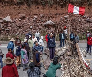 epa10391137 People block the Panamericana Sur highway for the second consecutive day as part of an anti-government protest, in the region of Cusco, Peru, 05 January 2023. Protests resumed on 04 January calling for the resignation of President Dina Boluarte, the release of former President Pedro Castillo, and early general elections. Pickets of citizens took the Pan-American highway at the height of kilometers 264 and 299, in an area of the Ica region, south of Lima, according to the Superintendence of Land Transportation of People (Sutran).  EPA/ALDAIR MEJiA