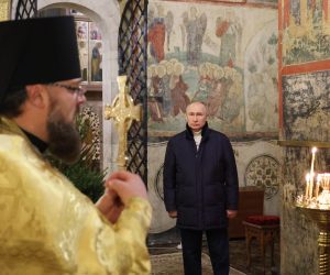 epa10393555 Russian President Vladimir Putin (R) attends a Christmas service at the Annunciation Cathedral in the Kremlin in Moscow, Russia, 07 January 2023. The Russian Orthodox church celebrates Christmas on 07 January according to the Julian calendar.  EPA/MIKHAEL KLIMENTYEV / SPUTNIK / KREMLIN POOL