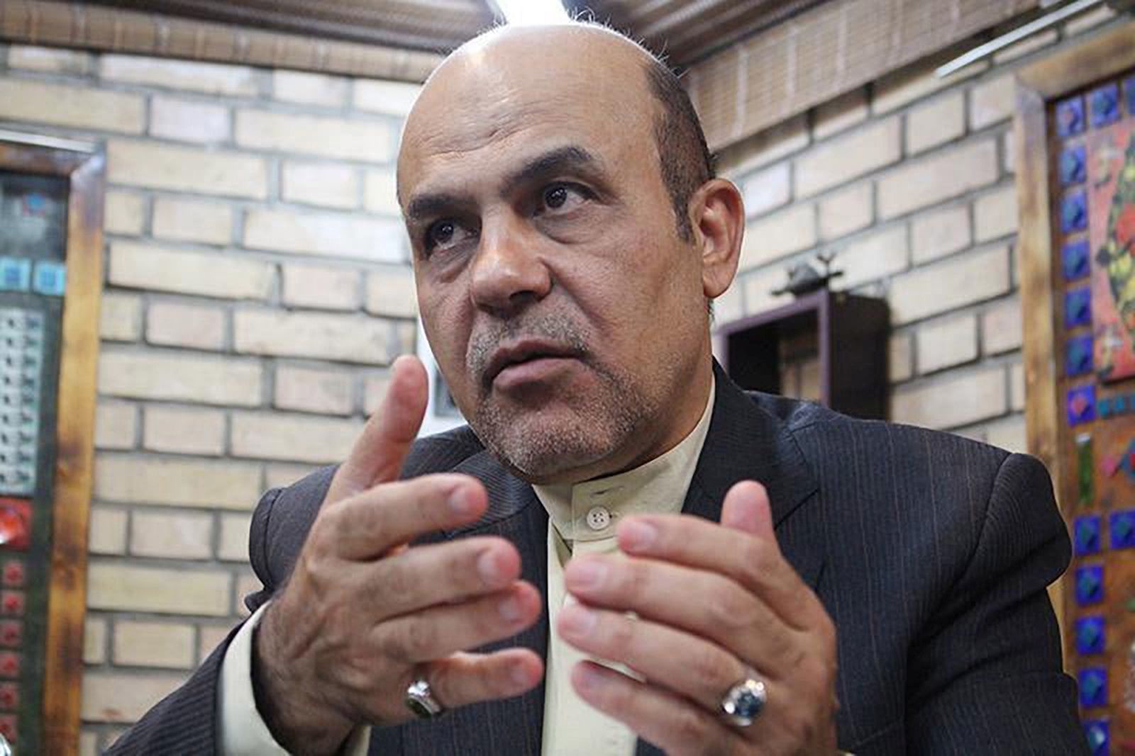 epa10401380 An undated handout photo made available by KhabarOnline news agency on 12 January 2023 shows former Iranian deputy of defence ministry Alireza Akbari during an interview in Tehran, Iran (issued 12 January 2023). According to Iran's official IRNA news agency, Akbari was setenced to death by execution for spying for Britain and acted against Iranian national security.  EPA/KHABARONLINE / HANDOUT BEST QUALITY AVAILABLE HANDOUT EDITORIAL USE ONLY/NO SALES