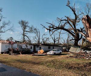 epa10402276 A trailer home with the roof ripped off from a tornado sits among the damage from a run of storms making their way through the South East of the US, in Mount Vernon, Alabama, USA, on 12 January 2023.  EPA/DAN ANDERSON