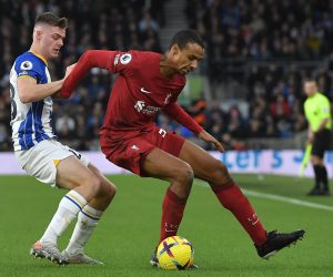 epa10405181 Liverpool's Joel Matip (R) in action against Brighton's Evan Ferguson (L) during the English Premier League soccer match between Brighton and Hove Albion and Liverpool FC in Brighton, Britain, 14 January 2023.  EPA/Vince Mignott EDITORIAL USE ONLY. No use with unauthorized audio, video, data, fixture lists, club/league logos or 'live' services. Online in-match use limited to 120 images, no video emulation. No use in betting, games or single club/league/player publications