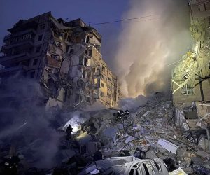 epa10405255 A handout photo released by the press service of the State Emergency Service (SES) of Ukraine shows Ukrainian rescuers working at the site of a residential building hit by shelling in Dnipro, southeastern Ukraine, 14 January 2023, amid Russia's invasion. At least 27 people were injured, among them six children, after a rocket hit the nine-story building in Dnipro, the SES reported. Russian troops entered Ukraine on 24 February 2022 starting a conflict that has provoked destruction and a humanitarian crisis.  EPA/STATE EMERGENCY SERVICE OF UKRAINE HANDOUT -- BEST QUALITY AVAILABLE -- MANDATORY CREDIT: STATE EMERGENCY SERVICE OF UKRAINE -- HANDOUT EDITORIAL USE ONLY/NO SALES