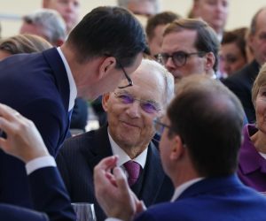 epa10408870 Polish Prime Minister Mateusz Morawiecki (L) talks after his speech to former German Parliament ‘Bundestag’ president Wolfgang Schaeuble (C) during a festive event on the occasion of Wolfgang Schauble's 50th anniversary in parliament, in Berlin, Germany, 16 January 2023. Former German Parliament 'Bundestag' president Wolfgang Schaeuble has served for more than half a century as a member of the German parliament ‘Bundestag. He is the first deputy having participated in parliament for such a long time.  EPA/CLEMENS BILAN / POOL