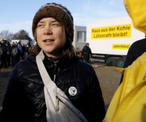 epa10410724 Swedish climate activist Greta Thunberg attends a rally of climate protection activists near the village of Luetzerath, Germany, 17 January 2023. The village of Luetzerath in North Rhine-Westphalia state is to make way for lignite mining despite the decision to phase out coal. The Garzweiler open pit mine, operated by German energy supplier RWE, is at the focus of protests by people who want Germany to stop mining and burning coal as soon as possible in the fight against climate change.  EPA/RONALD WITTEK