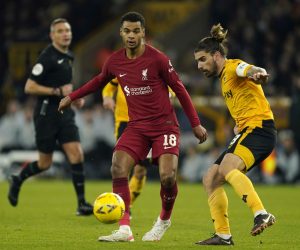 epa10411622 Liverpool's Cody Gakpo (L) in action against Wolverhampton Wanderers' Ruben Neves (R) during the FA Cup third round soccer match between Wolverhampton Wanderers and Liverpool FC in Wolverhampton, Britain, 14 January 2023.  EPA/Tim Keeton EDITORIAL USE ONLY. No use with unauthorized audio, video, data, fixture lists, club/league logos or 'live' services. Online in-match use limited to 120 images, no video emulation. No use in betting, games or single club/league/player publications