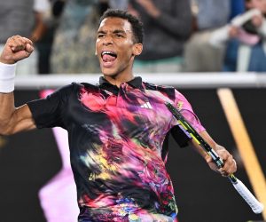 epa10412473 Felix Auger-Aliassime of Canada celebrates winning against Alex Molcan of Slovakia during the 2023 Australian Open tennis tournament at Melbourne Park in Melbourne, Australia, 18 January 2023.  EPA/JOEL CARRETT AUSTRALIA AND NEW ZEALAND OUT