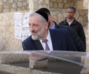 epa10422184 Israeli politician Aryeh Deri, who was appointed as Minister of Interior and Health leaves his house in Jerusalem, 22 January 2023. The Israeli Supreme Court ruled on 18 January 2023 that the appointment of Knesset member Rabbi Aryeh Makhlouf Deri to the position of Minister of the Interior and Health cannot stand. According to reports, the court ordered Prime Minister Benjamin Netanyahu to fire Deri from his post today.  EPA/ABIR SULTAN