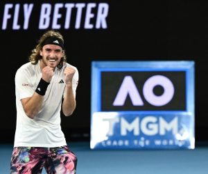 epa10422548 Stefanos Tsitsipas of Greece celebrates after winning his 4th round match against Jannik Sinner of Italy at the 2023 Australian Open tennis tournament in Melbourne, Australia, 22 January 2023.  EPA/JOEL CARRETT  AUSTRALIA AND NEW ZEALAND OUT