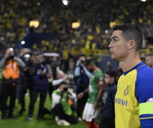 epa10423622 Al Nassr's Cristiano Ronaldo arrives to the pitch before the Saudi Pro League soccer match between Al-Nassr and Al Ettifaq in Riyadh, Saudi Arabia, 22 January 2023. Portuguese soccer player Cristiano Ronaldo will play his first match in Saudi Pro League after his transfer to Al-Nassr soccer club.  EPA/STR