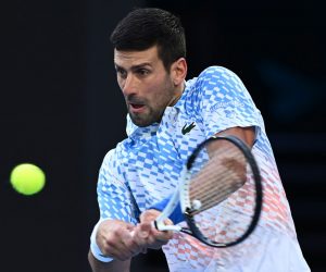 epa10424349 Novak Djokovic of Serbia in action during his match against Alex de Minaur of Australia at  the 2023 Australian Open tennis tournament at Melbourne Park in Melbourne, Australia, 23 January 2023.  EPA/JOEL CARRETT AUSTRALIA AND NEW ZEALAND OUT