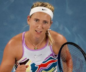 epa10426043 Victoria Azarenka of Belarus reacts while in action against Jessica Pegula of the USA during their quarter final match at the Australian Open tennis tournament in Melbourne, Australia, 24 January 2023.  EPA/FAZRY ISMAIL
