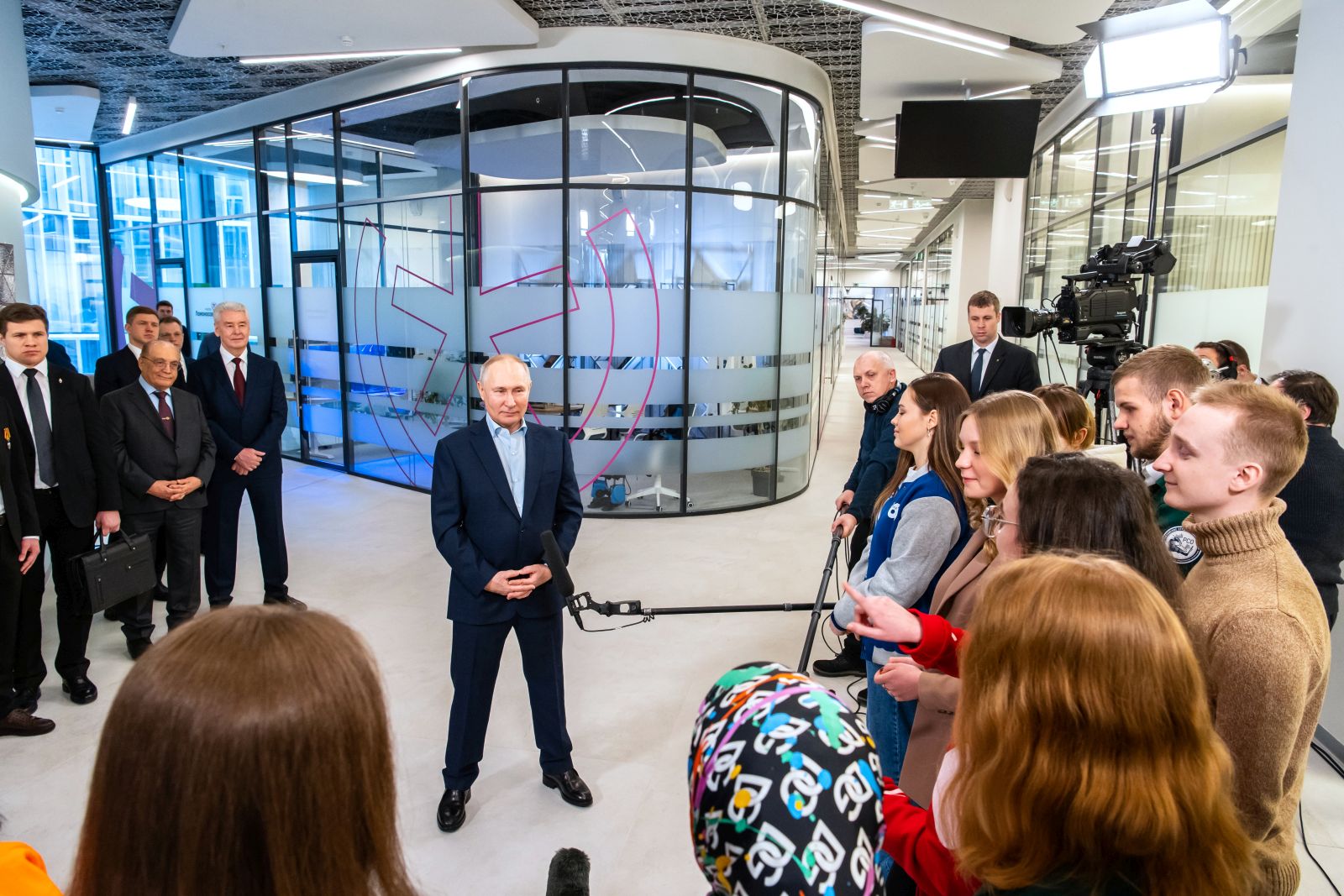 epa10428740 Russian President Vladimir Putin (C) speaks with students during his visit to the Lomonosov Moscow State University during the Day of Russian Students 'Tatiana's Day' In Moscow, Russia 2023. The name 'Tatiana's Day' comes from the name of the early Christian martyr Tatyana, whose memory is celebrated in the Orthodox Church on 25 January. After the establishment of Moscow University, 'Tatiana's Day' began to be celebrated first as the birthday of the university, and later as a holiday for Russian students.  EPA/MAXIM MISHIN / SPUTNIK / KREMLIN POOL / POOL