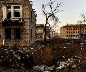 epa10434320 A shelling crater in Siversk, Donetsk region, eastern Ukraine, 27 January 2023. Ukrainian authorities ask people to evacuate from the frontline territories as there is no working infrastructure such as electricity, heating, water or gas left. Those who remain mostly spend their time in shelters, basements of residential buildings, due to the risk to die in Russian shelling. Russian troops entered Ukraine teritory on 24 February 2022, starting an armed conflict that has provoked destruction and a humanitarian crisis.  EPA/OLEG PETRASYUK