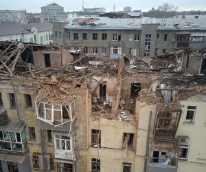 epa10439905 Ukrainian rescuers work on a residential building hit in Russian overnight shelling in Kharkiv, Ukraine, 30 January 2023. At least one woman was killed and three people were injured in the shelling, according to the Ukrainian Emergency Service. Kharkiv and surrounding areas have been the target of heavy shelling since February 2022, when Russian troops entered Ukraine territory starting an armed conflict that has provoked destruction and a humanitarian crisis.  EPA/SERGEY KOZLOV