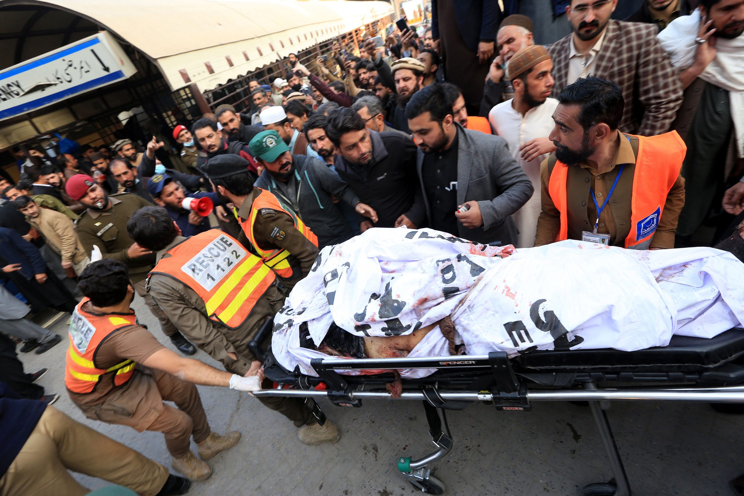 epa10440068 A victim of the blast at a Mosque is shifted to a hospital in Peshawar, Pakistan, 30 January 2023. At least 28 worshippers were killed and dozens injured in a blast during prayers at a Mosque situated in Police lines in Peshawar, Ghulam Ali, Governor of KPK province said.  EPA/ARSHAD ARBAB