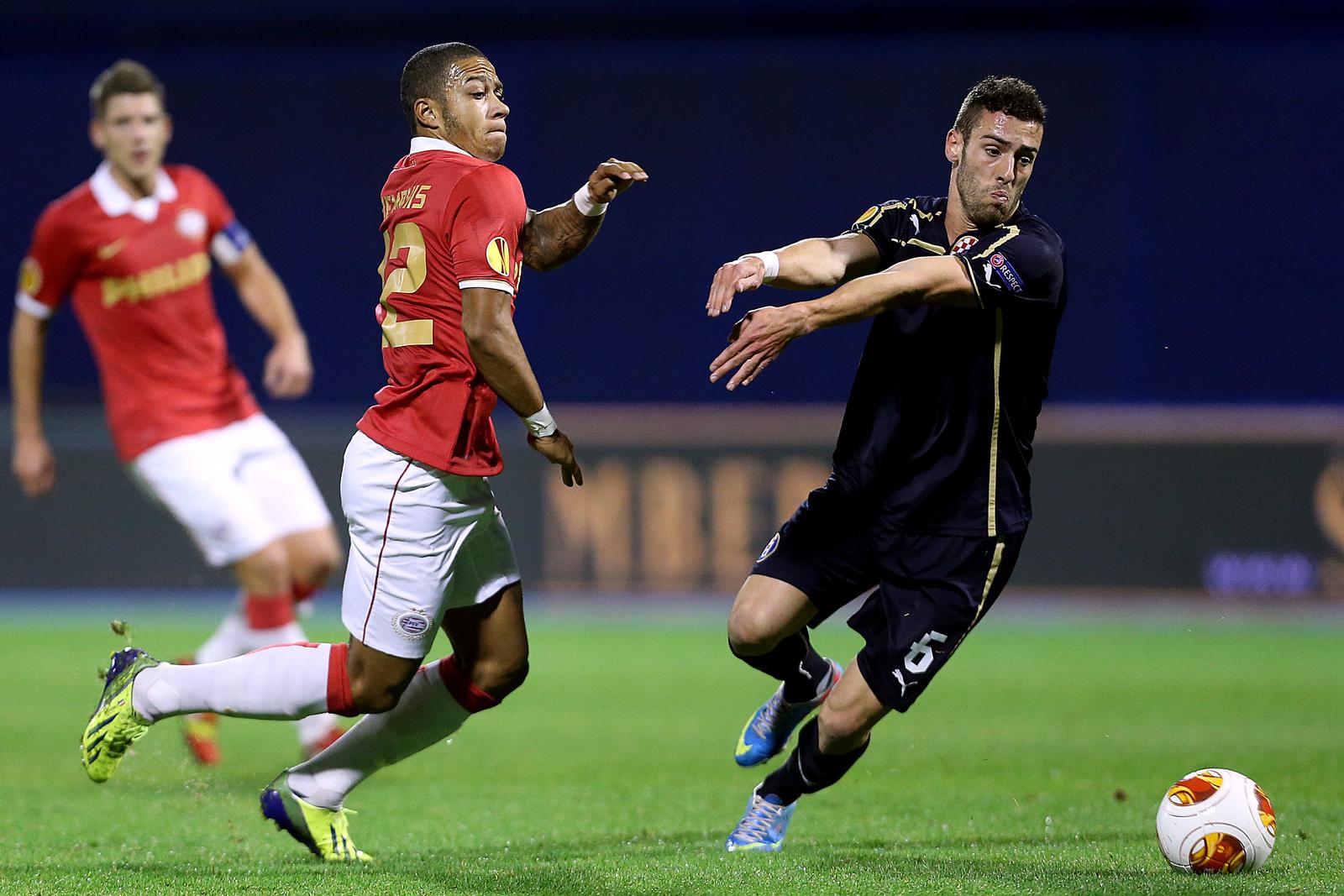 24.10.2013., stadion u Maksimiru, Zagreb - Trece kolo Europa lige, GNK Dinamo - PSV Eindhoven. Memphis Depay, Ivo Pinto. "nPhoto: Goran Stanzl/PIXSELL