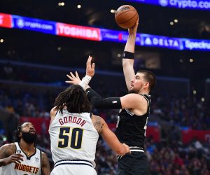 January 13, 2023; Los Angeles, California, USA; Los Angeles Clippers center Ivica Zubac (40) shoots against Denver Nuggets forward Aaron Gordon (50) during the first half at Crypto.com Arena. Mandatory Credit: Gary A. Vasquez-USA TODAY Sports Photo: Gary A. Vasquez/REUTERS