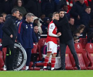 Soccer Football - Premier League - Arsenal v Manchester United - Emirates Stadium, London, Britain - January 22, 2023 Arsenal's Leandro Trossard with manager Mikel Arteta before coming on as a substitute REUTERS/David Klein EDITORIAL USE ONLY. No use with unauthorized audio, video, data, fixture lists, club/league logos or 'live' services. Online in-match use limited to 75 images, no video emulation. No use in betting, games or single club /league/player publications.  Please contact your account representative for further details. Photo: David Klein/REUTERS