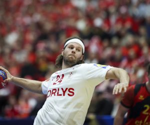 epa10403753 Denmark's Mikkel Hansen in action during the IHF Men's World Championship group H handball match between Denmark and Belgium in Malmo, Sweden, 13 January 2023.  EPA/ANDREAS HILLERGREN SWEDEN OUT